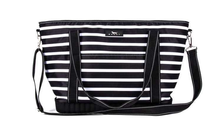 A large, soft cooler you can sling over your shoulder like a tote bag? Sign up here! The molded bottom stands up to any surface and it comes with a long, detachable strap for carrying versatility. Not just reserved for snacks and drinks either.