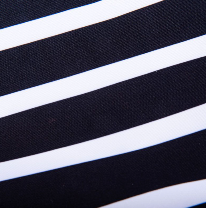 A large, soft cooler you can sling over your shoulder like a tote bag? Sign up here! The molded bottom stands up to any surface and it comes with a long, detachable strap for carrying versatility. Not just reserved for snacks and drinks either.