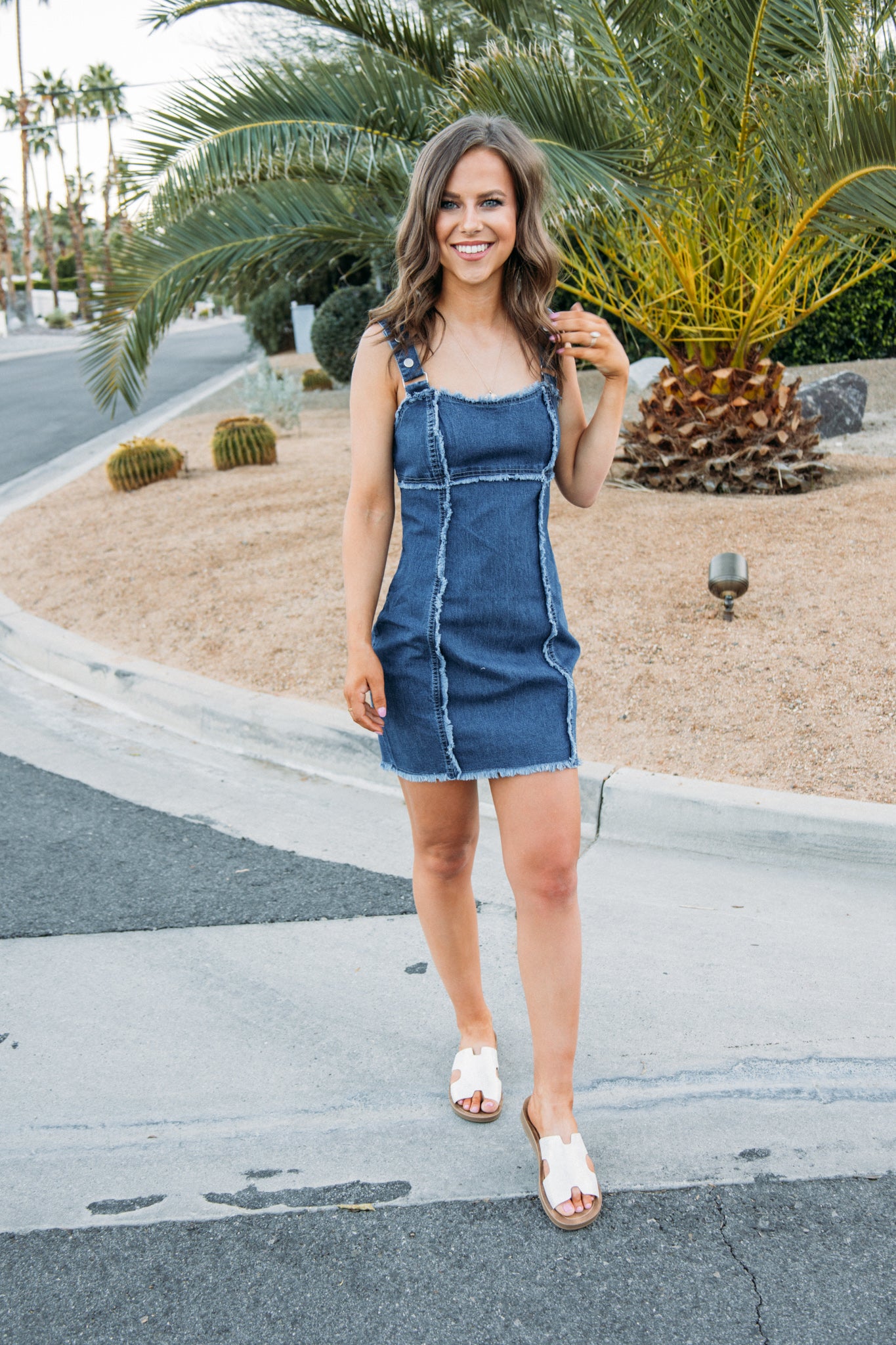 A cute denim dress that is so on trend! Pair with sandals and a cardigan for a cute summer look or pair with white boots for a western look!