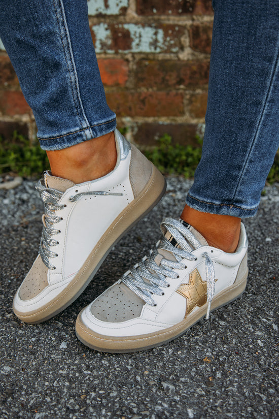A classic shoe that is a staple! The white Rosalia Sneaker features a tan suede tongue with a gold star and silver heel tab. So trendy and super comfortable for everyday wear! These are perfect for a casual day of running errands or super cute dressed up for a casual date! 