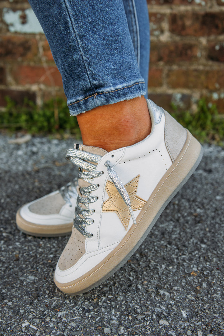 A classic shoe that is a staple! The white Rosalia Sneaker features a tan suede tongue with a gold star and silver heel tab. So trendy and super comfortable for everyday wear! These are perfect for a casual day of running errands or super cute dressed up for a casual date! 