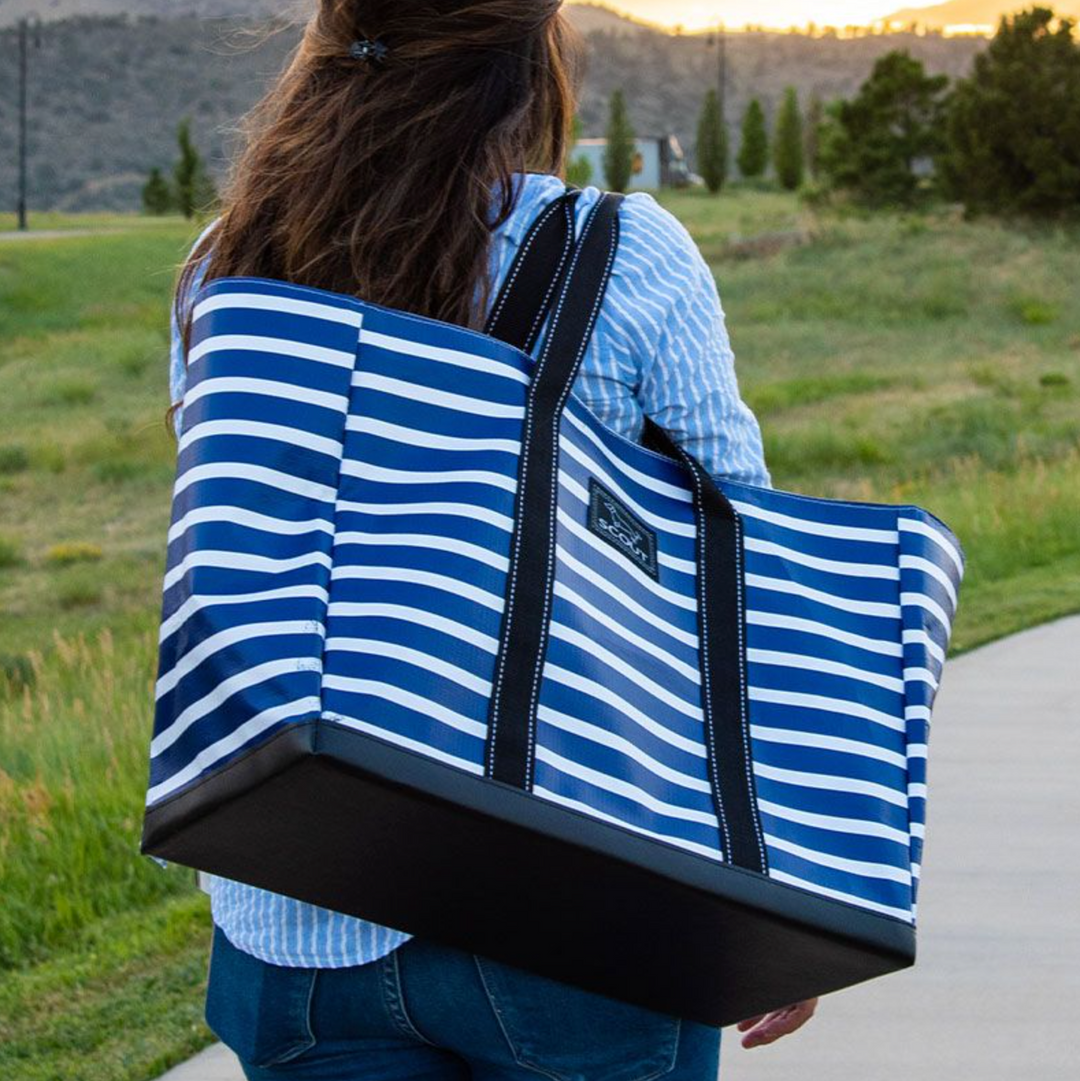 Our first bag design remains our #1 best-seller. There's a reason for that—this tote with a burst-proof bottom is ideal for carrying pretty much everything. It’s the bag you didn’t know you needed but can’t live without. The fold-flat design allows for easy storage.
