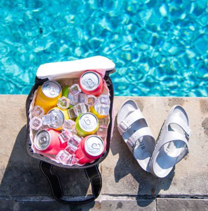 Ideal for family outings, this cooler fits a six pack or four wine bottles. It's just the right size to stack multiple food containers. There are two outside pockets to hold napkins and utensils, or candy bars (no judgement here!).